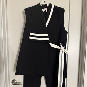 Woman suit black and white